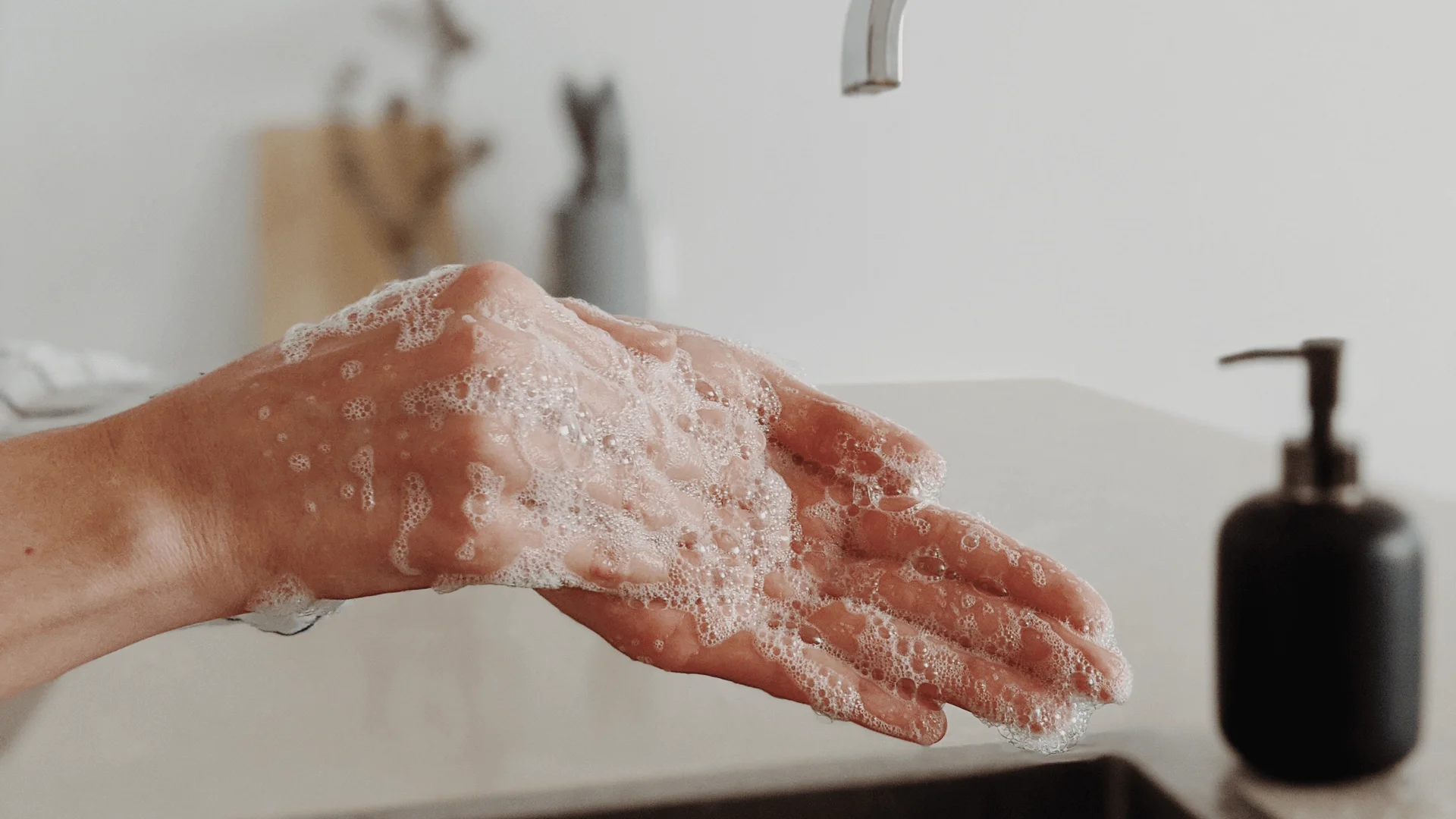 washing hands using coconut soap