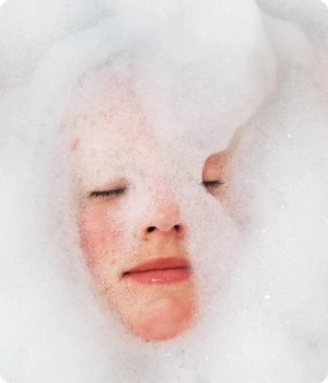 woman face bubble bath